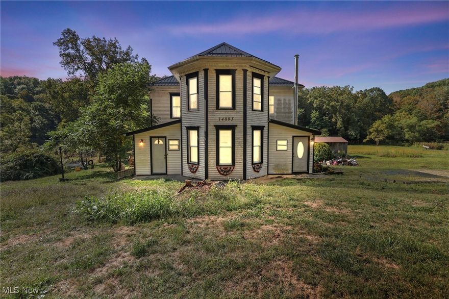 Looking for charm and character? Don't miss this beautiful 1889 Farmhouse situated on 2.19 acres in Tri-Valley Schools! Step inside to a welcoming entry with a wood-burning stove that flows into the spacious dining room—perfect for large family gatherings. The dining room connects to a generous kitchen with plenty of space for everyday meals. Just off the kitchen, you'll find a side porch currently used for pantry/storage—a great opportunity to convert into a 3 or 4 season room. The first floor also features a comfortable living room for relaxing plus a full bath with first-floor laundry. Upstairs, you'll discover 3 nice sized bedrooms with ample closet space (rare for a home of this era!). Enjoy outdoor living on the deck great for entertaining, with a large yard that includes a chicken coop, dog run, and open-stall barn. At the back of the property, a peaceful stream completes the setting. Additional highlights include a full basement with plenty of extra storage, a wood-burning furnace, and even a sunken tub. Throughout the home, you'll find 3 decorative fireplaces located in the dining room, living room, and primary bedroom—adding warmth and charm to each space. Filled with original charm—wood doors, trim, and floors throughout—this home also offers modern updates including a metal roof and new well pump (2021). With plenty of parking and privacy, this property combines history, character, and functionality.  Dishwasher has not been hooked up.  Seller needs to find suitable housing.