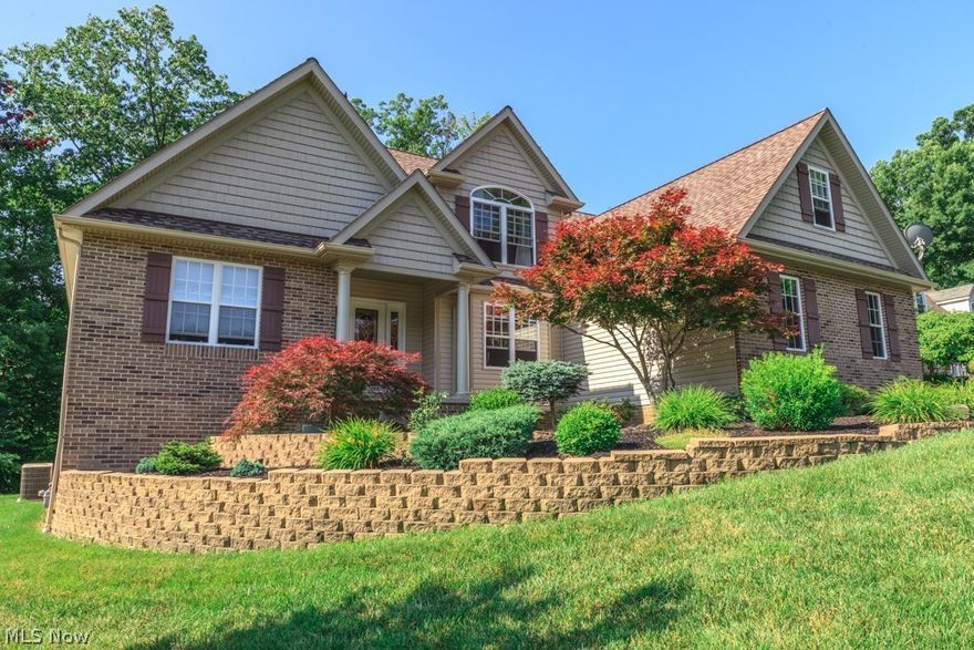 Welcome to this meticulously cared for Colonial. The manicured yard and professional landscaping provide impressive curb appeal. Situated on one acre, this home features a 2 story Foyer, off the Foyer is the Great Room with a fireplace that is flanked by windows on the side as well as a half moon window above the fireplace. The Eat-In Kitchen features beautiful Cherry Cabinetry and Corian counter tops along with a Formal Dining Room that has an opening to both the Foyer and Kitchen. The formal Dining Room has crown molding along with chair rail molding. The first floor Master Bedroom features a bay window and walk-in closets. The first floor Master Bathroom has a walk-in shower as well as a bathtub. The first floor Laundry Room completes the main floor. Upstairs you will find three spacious Bedrooms along with another full Bathroom plus a loft overlooking the Great Room. The finished Lower Level is a great place for entertaining with a full bar including a wet sink, a fireplace and a f