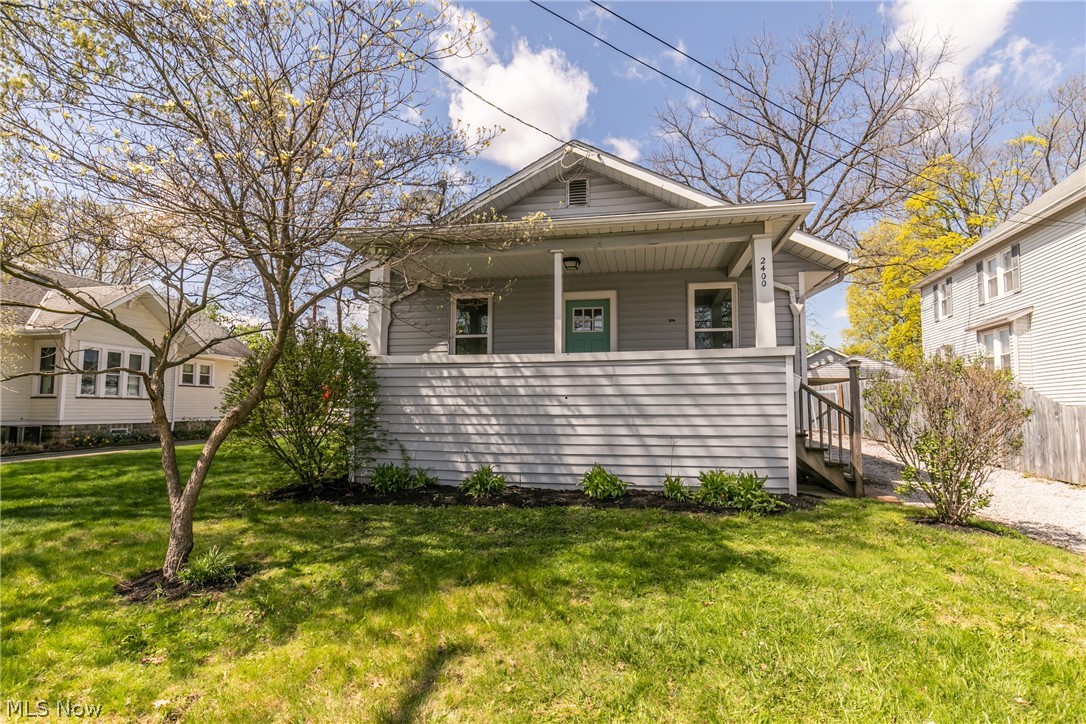 Welcome to this stunning, updated ranch in Cuyahoga Falls! A darling front porch to sit on, and enjoy a book or look out over the neighborhood. An impressive family room with tons of natural light shining in from the windows, and do not miss the amazing fireplace. The remarkable kitchen has all been updated with beautiful subway tile to accent the counter top, cupboards and stainless steel appliances. Three nicely sized bedrooms with new carpets and fresh paint. New flooring and fresh paint throughout the whole house, and new roof. This turnkey ranch will not last, check it out today!