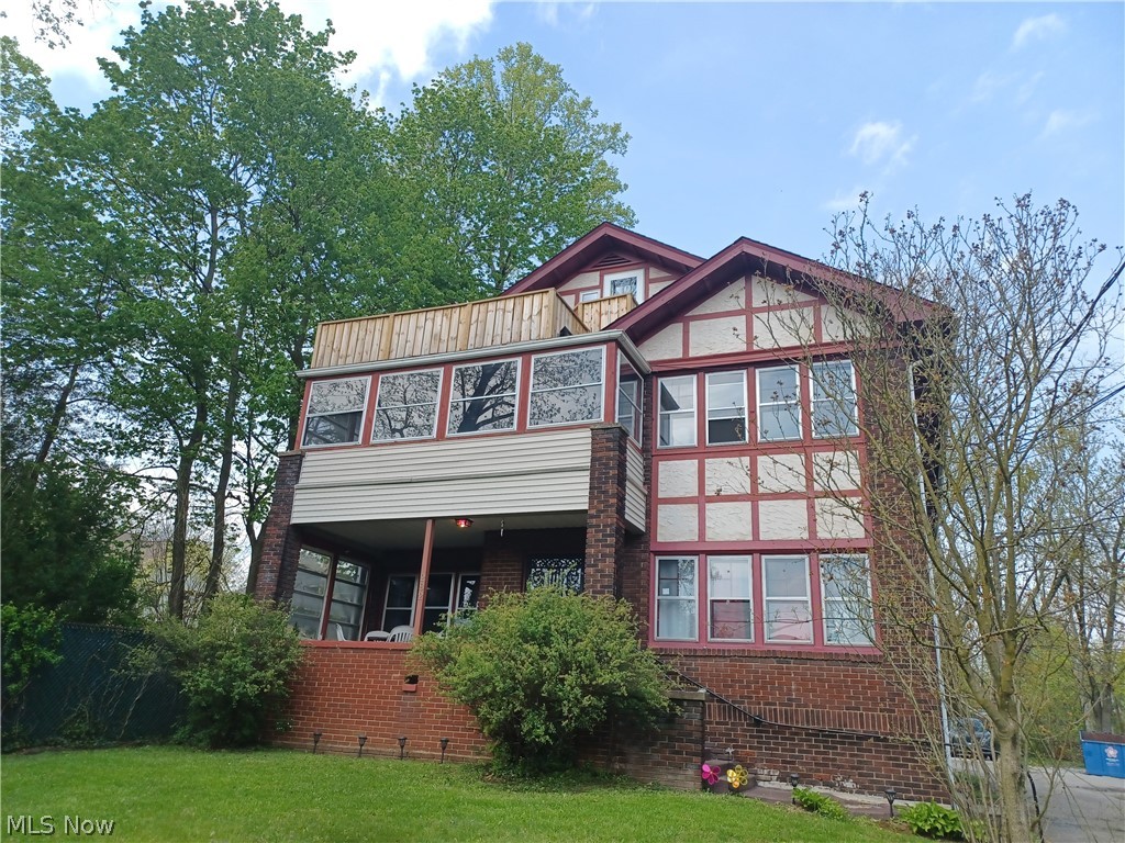 This fine Victorian Manor is currently a four Plex. Originally built in 1915 as a spectacular home! Four unit brick multi-family. Wonderful view, close to YSU and hospitals. Spacious, old charm, lots of great architecture. Built-in china cupboards and bookcases. Original woodwork in most rooms; hardwood floors under carpets. Three & 4 bedroom, Formal dinning room & living room with fireplace 1st and 2nd flrs. Front porch and balcony; 3rd floor two bedrooms and outstanding balcony. Basement one bedroom. Good investment Charming first floor sunroom overlooking rear yard.. Ask for details and what is included. Super well designed and in excellent condition. Seller just renovated 2 units, cleaned gutters and had roof inspected and replaced 7 years ago. . Security system ,2 newer Boilers 5 yrs. old, updated electric throughout. Financial info. available to qualified Buyer! Great Cash Flow, Owner pays all gas, and water/sewer bills units have smoke detectors, CO Detector, Dryer, Range, Refrigerator, Security System ,and Washer on site. 3out of 4 tenants were section 8, all under leases and well managed, no issues. Total sq. footage is 5592! Each unit has their own breaker box. secure entry drs. off street parking, lighted & paved. Great balconies, or enclosed porched, beautiful wood work & more! Wow! First Mansion at corner of Fifth Ave. and Fairgreen!