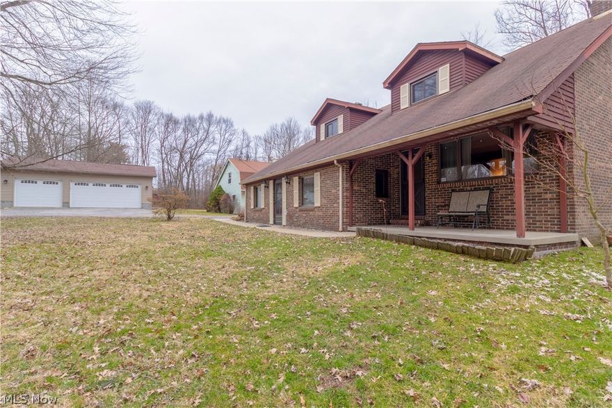 Country living with hard woods surrounded by your house? If that's what you're looking for here it is! This 3 bedroom, 4 FULL baths is ready for you to call it home. Each bedroom has it's own private bathroom. The HUGE kitchen has pine flooring with tons of cabinet space with an one of kind brick fireplace. The perfect area to entertain your guest and family. The living room has another beautiful stone fireplace with sliding doors out to the sun room offering a panoramic   view of the woods. Bonus room on the main living space can be converted into a family room or keep it as a billiards space. 3 car detached garage with tons of space. The additional building offers a perfect space for an mother in law suite or income property which currently has 2 bedrooms 1 bath and updated kitchen. Call/Text today for your private showing!! AC 2018, Back section of roof 2017, Attic Fan 2017 Hubbard School District. #Hubbard #Country #TrumbullCounty