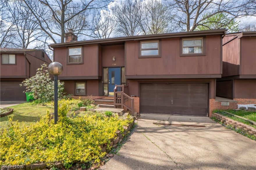 Enjoy condo living with a private wooded backdrop in Massillon's desirable Ledgewood community. The bi-level layout features an open floor plan connecting the living room to the eat-in kitchen on the main level, along with three bedrooms and a full bath down the hall. The lower level adds a comfortable family room with a wood-burning fireplace and walk-out access to the deck. You'll also find a half bath, laundry room, and convenient entry to the attached two car garage. Set in a prime location, this condo is close to Belden Village amenities as well as shopping and dining in Massillon. Schedule your showing today!
