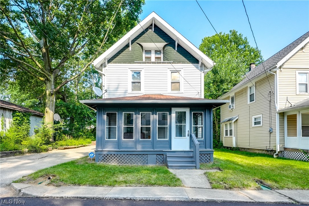 Welcome to this charming, freshly painted home in a convenient location just minutes from downtown Akron, Akron University, and Summa Hospital! As you step inside, the living room immediately catches your eye with its exquisite wood accents and warm wood flooring. Adjacent to the living room is the inviting dining room, with a charming window seat that lets you sit and enjoy the natural light filtering through. The kitchen boasts ceramic flooring that is both functional and stylish. Abundant cabinet space provides ample storage for all your culinary essentials, ensuring a clutter-free and organized cooking experience. A smaller nook area within the kitchen provides even more cabinet space, offering an ideal spot for pantry items. Venturing upstairs, you'll discover three bedrooms graced with the same stunning wood flooring found throughout the main living areas. The full bathroom features a tub/shower combo, a single vanity, and a tastefully designed tile shower. But that's not all – t