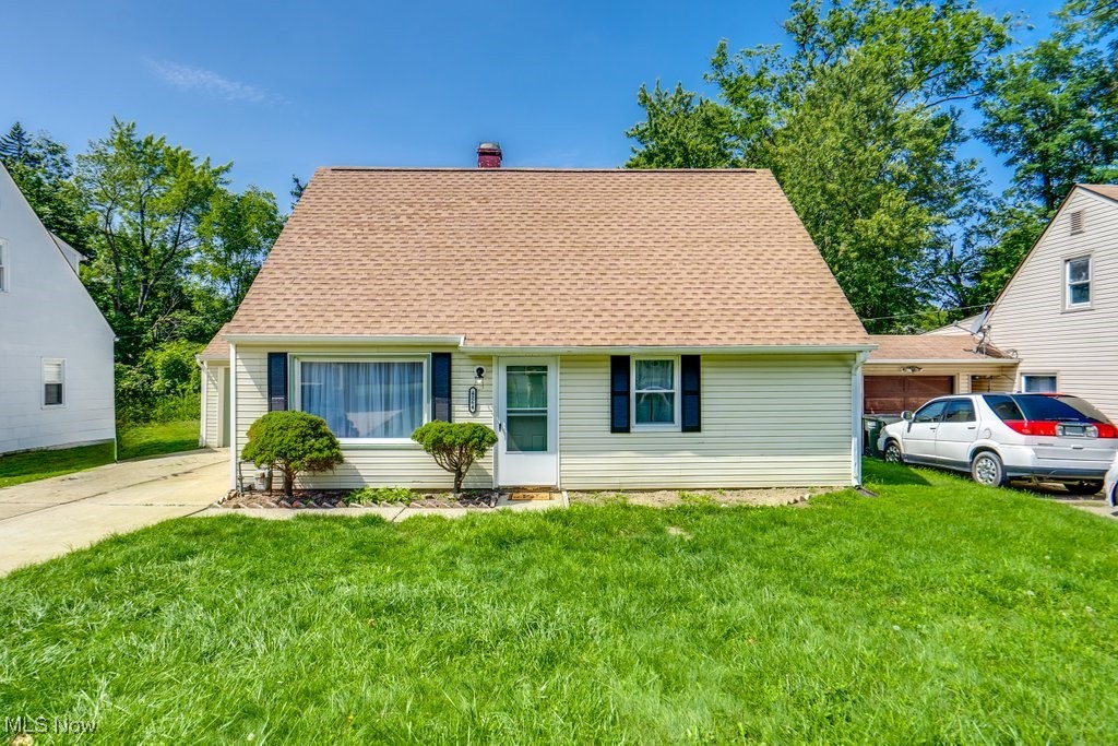 Back on the market through no fault of seller. Are you looking for an updated and beautiful home with room for everyone? Take a look at this absolutely charming cape cod located in Warrensville Heights and within minutes of schools, shopping, an Amazon distribution center, the Jack Thistledown Racino and hospitals. This spacious property boasts four bedrooms, a new and updated kitchen with stainless appliances, an updated bathroom, new vinyl plank flooring, new carpet and an amazing family room complete with built in bar and new double pane windows. The level entry makes first floor living easy for those who don't do stairs. The kitchen is host to the closeted laundry area as well. Both the front and rear entry doors are new. The attached one car garage can be accessed through the family room so it makes loading the car easy during inclement weather. New furnace (2023), complete roof replacement (2021), garage concrete (2023) new flooring (2023 & 2024) some windows (2023) appliances (2023). This home is violation free. Hurry....this super cute house will not last. There are so many options including multi generational living, AirBnB, rental, etc. House appraised at full value with NO repairs. Inspection items taken care of and clean POS with Warrensville Heights is ready for the new owner. FHA compliant.