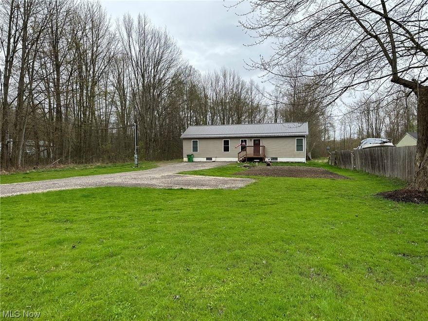 MUST SEE this 3 bedroom, 2 full bath recently built in 2019 sitting on nearly 1 acre with a fully stocked pond. Share this completely rural setting with native wildlife while being within close proximity to Ashtabula, Geneva, and surrounding communities. Plus close to Geneva-on-the-Lake, local wineries, and other attractions! Perfect for your everyday home or a weekend/summer getaway! Enter into a wide open living and dining area complimented by a fully-equipped kitchen with plenty of cabinets and storage space plus granite countertops. All appliances included! You will love having everything on the first level including the laundry and both baths. A full basement with high ceilings and a walk-out to the rear adds additional storage or possible living space. Septic new in 2019, serviced 2023. Furnace/heat pump serviced 2023, plus premium Cinch Home Warranty is included! Don't miss your chance with this one! Call your favorite REALTOR® and consider this home and property today!