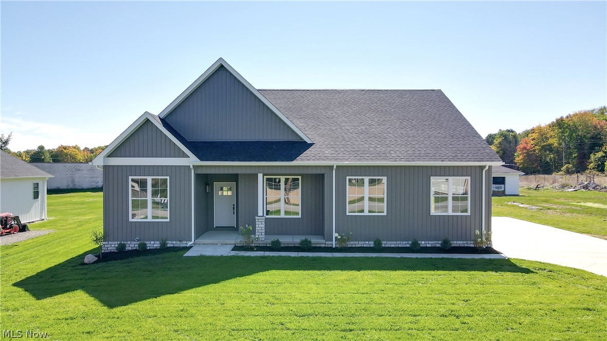 COMPLETED NEW CONSTRUCTION. Ready to move in with tons of upgrades! This beautiful new home features Vaulted & 9 ft Ceilings throughout. City Utilities & Brookfield Schools. First floor is 1715 sq ft with 3 bedrooms & 2.5 Baths. Finished basement is approximately 500 sq ft with family room and full bath. Custom Amish kitchen with (Included) stainless appliances / backsplash / undercabinet lighting/ soft close cabinets/ built in pantry & microwave. New Pella windows throughout. Waterproof laminate wood flooring throughout 1st floor / waterproof vinyl flooring in basement. Yard and landscaping already completed with new concrete drive. 2 car attached garage at 532 sq ft with side entrance. Concrete front and rear porch/patio – French door access to rear. Custom shower & title – master bath / tile floors in all baths upper level. Upgraded trim package & solid doors throughout. 1st floor laundry . Private Master bedroom .Hot water on demand