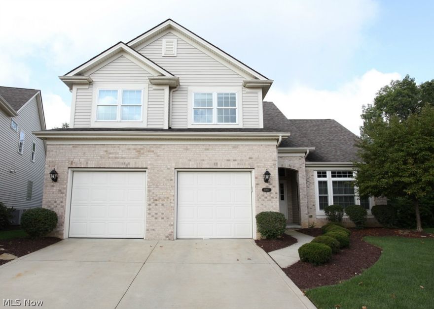 Absolutely exquisite!  This one has it all - vaulted ceilings in living room with cascading staircase.  Neutral colors and maple trim throughout.  Spacious bedrooms and finished basement with rec room.  Kitchen features cherry cabinets and attached sun room. Backyard features professional landscaping and huge stamped concrete patio. Welcome home to this cluster in a prime cul-de-sac location!