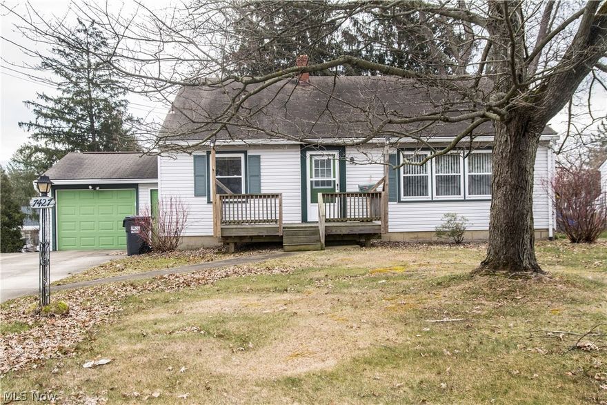 Wow! 4 Bedrooms and over 1600 sq ft in this nice Bi-level home located just minutes away from shopping, schools, dining and more...  Be in this new home soon so you can enjoy the spring and summer in your back yard gardening, cooking out or sitting on the front porch with family and friends...  The first floor offers a nice sized living room with large windows for great lighting and a kitchen which leads to the laundry area and possible office or storage room.  Just a few steps down from the living room is a bedroom and a half bath giving a sense of first floor living.  Upstairs you will find a full bath, 3 more bedrooms all with hardwood floors and nice newer looking vinyl windows. Also, a clean walk up attic for extra storage. Updates include newer hot water tank, toilet in upstairs bathroom, garage door and opener, and electric box.  Inside was freshly painted white but can be totally transformed with color and decor!