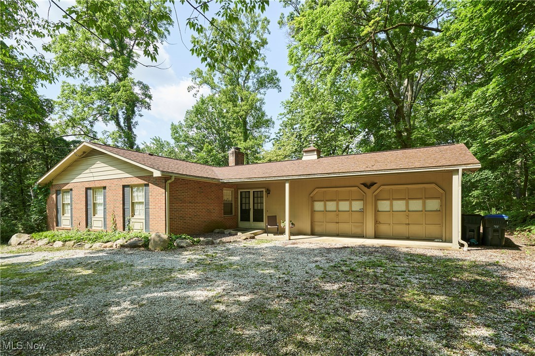 This spacious ranch-style home offers great potential and a solid foundation for your personal touches. Situated on over 1.6 acres, this lovely home features approx. The home features 1,800 square feet of living space, including three generously sized bedrooms with wood flooring and two full bathrooms. As you tour the interior, you’ll find two living rooms offering cozy fireplaces, each with comfortable carpeting. The main-floor laundry adds convenience, while the open, unfinished basement presents a fantastic opportunity for additional living space, a home gym, workshop, or simply plenty of extra storage. Located on State Road, this home offers easy access to shopping, restaurants, a movie theater, and more—making everyday errands and entertainment just minutes away. With a creative vision and updating, this home could truly shine. A great opportunity to create the home of your dreams in a prime location.