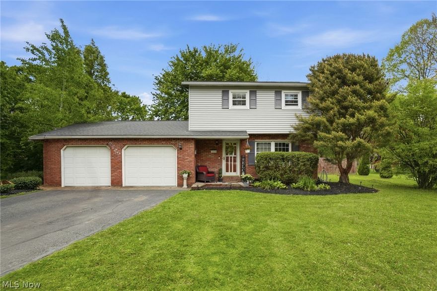Welcome to Leroy Township, where space, privacy, and classic colonial charm come together on 1.31 acres of beautifully landscaped property. This 3-bedroom, 1.5-bath colonial is positioned in a highly desirable rural setting and delivers the features today's buyers are actively searching for-acreage, fenced yard, fireplace, and a covered outdoor living space. Inside, the living room is filled with natural light and offers a warm, inviting atmosphere with an easy flow into the main living areas. The kitchen features rich hickory cabinetry, ample storage, and a functional layout designed for both everyday living and entertaining. A convenient half bath is located on the main level for added practicality. The spacious family room serves as the heart of the home, showcasing a brick hearth with a wood-burning fireplace and wood-burning stove, creating a cozy focal point for gatherings throughout the seasons. From this space, access to the covered deck extends the living area outdoors, overlooking the fully fenced backyard and wide-open green space. Upstairs, three well-proportioned bedrooms provide comfortable private retreats, including a generously sized primary bedroom with storage and flexible layout options. Additional highlights include mature landscaping, strong indoor-outdoor connection, and a setting that balances privacy with convenience to local amenities, parks, schools, and commuter routes. Move-in ready and thoughtfully maintained, this property offers space to spread out, room to grow, and the kind of setting that is increasingly hard to find in today's market.