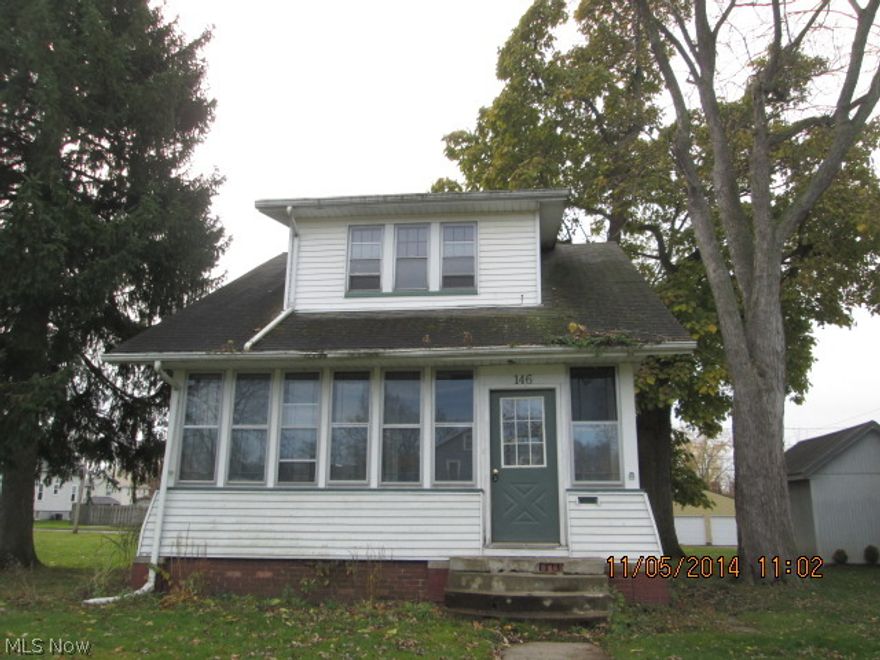 This home in Sebring offers 3 bedrooms 1 1/2  baths, enclosed front porch, large rear deck, central air & partially finished basement.