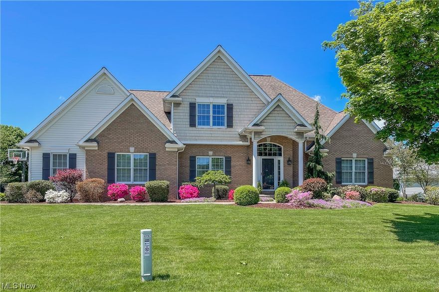 You will fall in love with the floorplan of this gorgeous 4 four-bedroom, 3.5 bath Jackson Township home in Carrington Estates! The owners have taken extreme care in maintaining and tastefully updating the home from top to bottom. Upon entering the home from the spacious three-car garage, you'll be pleasantly delighted with a built-in locker area for dropping coats and book bags and a first-floor laundry! The bright maple eat-in kitchen has a lovely slider to the outdoor entertaining area. Your guests will love the stamped patio with a built-in gas fire pit and the immaculate black iron-fenced backyard. Back inside, the kitchen opens to a two-story great room with a floor-to-ceiling stone-faced fireplace. Not only is the master suite with double walk-in closets and a large master bath conveniently located on the first floor, but a second first-floor bedroom is also nearby, perfect for keeping little ones close! With so much natural light pouring into this space, the cheery office is th