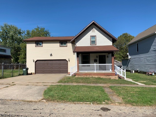 Don't miss this one!! Spacious updated home on double lot with 3 bedrooms and a fenced-in yard. Huge master bedroom with 1/2 bath and upstairs laundry. New 1/2 bath put in on main level. Large kitchen with newer flooring and plenty of cabinet space. This home has had many updates within the last 5 years that include furnace, A/C unit, windows, vinyl siding, trek deck, front porch and sidewalk, basement waterproofing, block windows in basement and tankless water heater to name a few. Move-in ready with immediate possession. Call today to view!