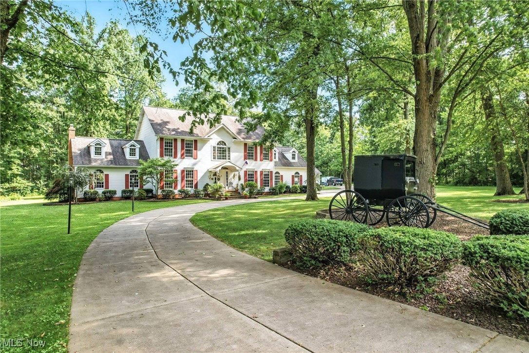 Don't miss this Quality Built home located in a beautiful wooded setting in Canfield Township with Canfield Schools! The location offers a few acres of privacy and space. The home has been well-maintained throughout! A 2nd Story Foyer welcomes you inside. To the left of the Foyer is a Living Room/Dining Room and to the right is a large Office(possible 1st Floor Bedroom). The Kitchen has been updated with granite countertops, composite sink and a large center island. The Eating Area overlooks the scenic backyard and opens to the very large Family Room with new neutral carpeting(05/25), cathedral ceilings, skylights and a lovely stone gas fireplace. There are lots of windows for natural lighting throughout the home. The Full Bath and 1st Floor Laundry Room/Mud Room between the Kitchen and the attached Garage finish off the 1st Floor. Upstairs the Master Bedroom and Master Bath feature cathedral ceilings. The Master Bath offers a large walk-in-shower, soaking tub, 2 vanities with granite and a walk-in-closet. The add'l 2 bedrooms are across the hall with their full bath. Carpeting on the 2nd floor is newer. The full basement has plenty of space with daylight windows and shelving for storage. Outside there is a patio for entertaining, invisible fencing and a 2nd 2 Car Garage with a shed for storage. Updates: Furnace & A/C, 2022;Roof & Gutters, 2014; upstairs carpet 2022; Refrigerator, Washer & Dryer 2024. Many updates throughout! It's easy to visualize yourself living in this extraordinary home & neighborhood!