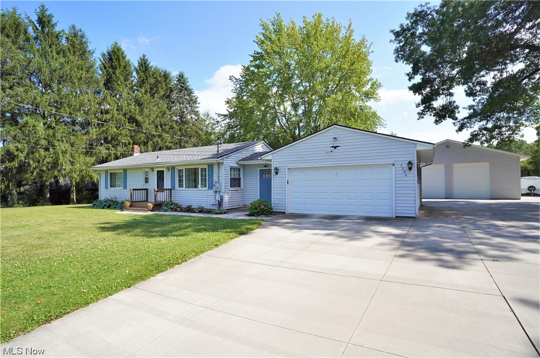 If you are looking for a property that is a paradise, this is the one. With over 11 acres, this property includes walking trails, a pond, winding privacy lanes that take you back to your own swing that overlooks a stream, all next to a large corn field...this is the one that you will want to stay forever! Had it not been for a job transfer, these sellers would have stayed as well! The four wheelers have room to ride around the property for fun, or take you to your place to relax and reflect. Who needs a massive detached 36 x 48 building to store your toys such as your campers, Boats, or extra cars? Additional parking next to that building as well! No worry about parking because the concrete parking availability is amazing! Inside, this ranch has a nice mudroom to remove the muddy boots from the back forty. 3 bedrooms and 1 bathroom with an eat-in kitchen and spacious living room round out the first floor. The basement is also finished with one very large room, bar, and the sellers a