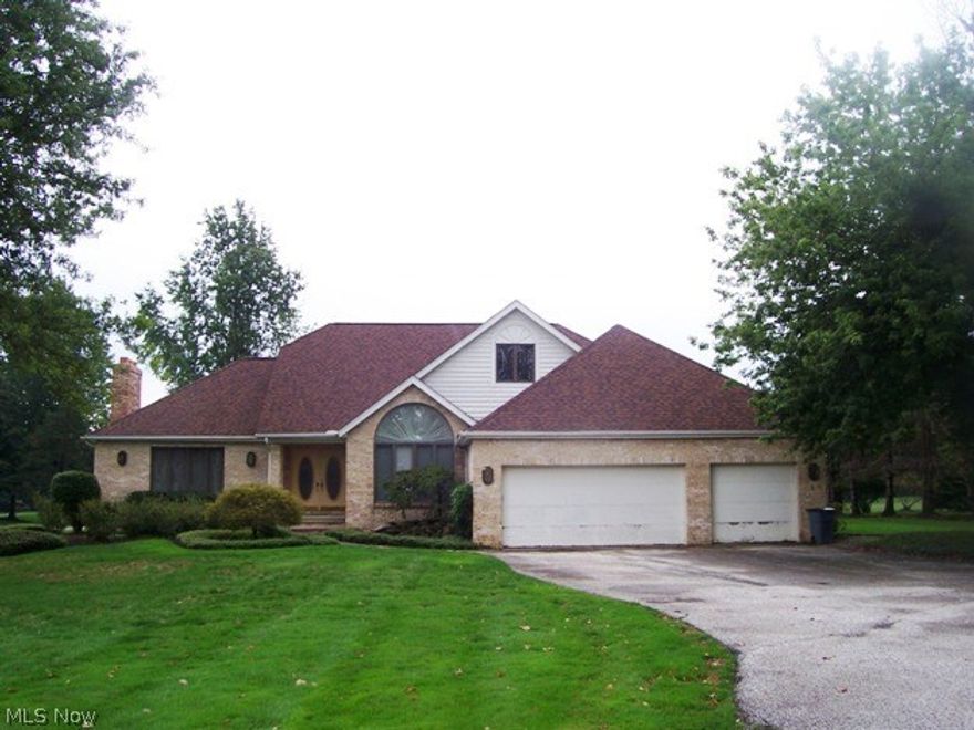 Spacious contemporary home on magnificent one acre yard!  Large great room with fireplace! Formal dining room with big picture window! First floor master suite with master bath.  Three spacious bedrooms upstairs with two more full baths up.  Half bath on main floor.  Newer roof and AC unit.  Home has screened in porch.  Full basement also.  3 Car garage.  Nice deck off the back overlooks picturesque yard. Owner to take care of landscaping, grass cutting, and snow plowing.