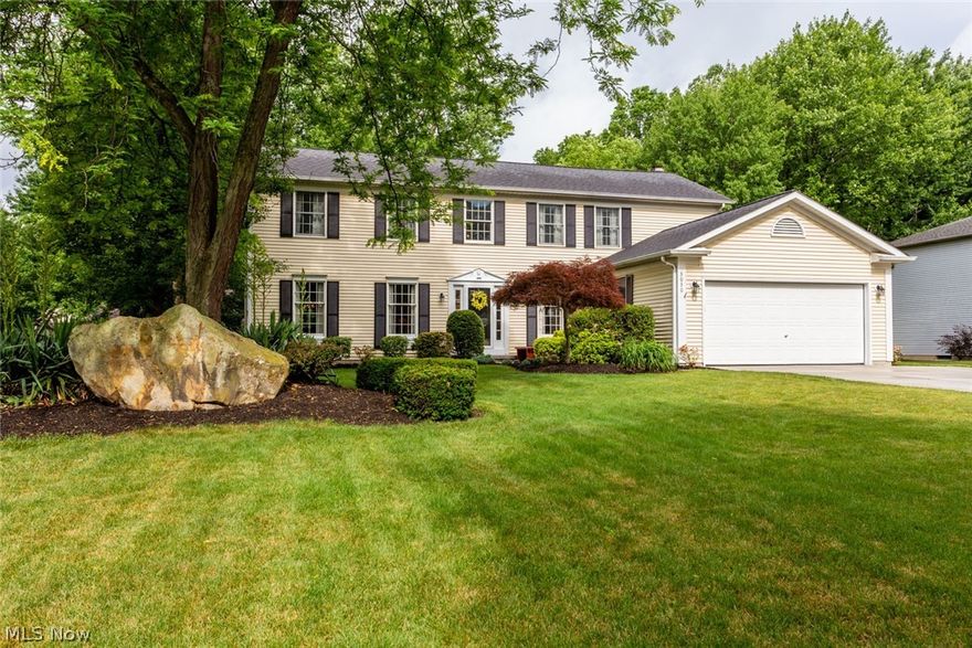MOVE IN READY!!  Beautifully updated 2820 sf colonial home in the secluded Creekview Development in Avon. The fresh paint colors and updated light fixture make the open front foyer bright and airy.  To the right, the home office has a wall of built in shelves and double french doors for privacy when needed.  To the left, the open living and dining room have wood floors and large windows for larger family gatherings and parties.  In the back, the spacious eat in kitchen with granite countertops, island, large pantry, and bay window is open to the family room which offers a brick fireplace and french doors to the back patio. All of the solid wood base boards, trim boards and doors have been painted to really update this home. All of the ceiling fans and most light fixtures have been updated.   The half bath and  first floor laundry are off of the garage for easy accessibility from outside. Upstairs, the large master suite has an updated master bath with new tub and beautiful tile floor a