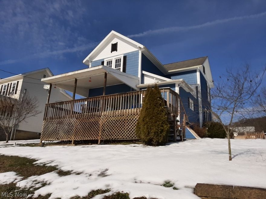 Two story home in move in condition with four bedrooms, two full baths on first floor, fenced in back yard oversized detached garage. A 24 x 12 covered porch with attached deck area for your grill and river view. Back porch with concrete floor. Water source is a public well.