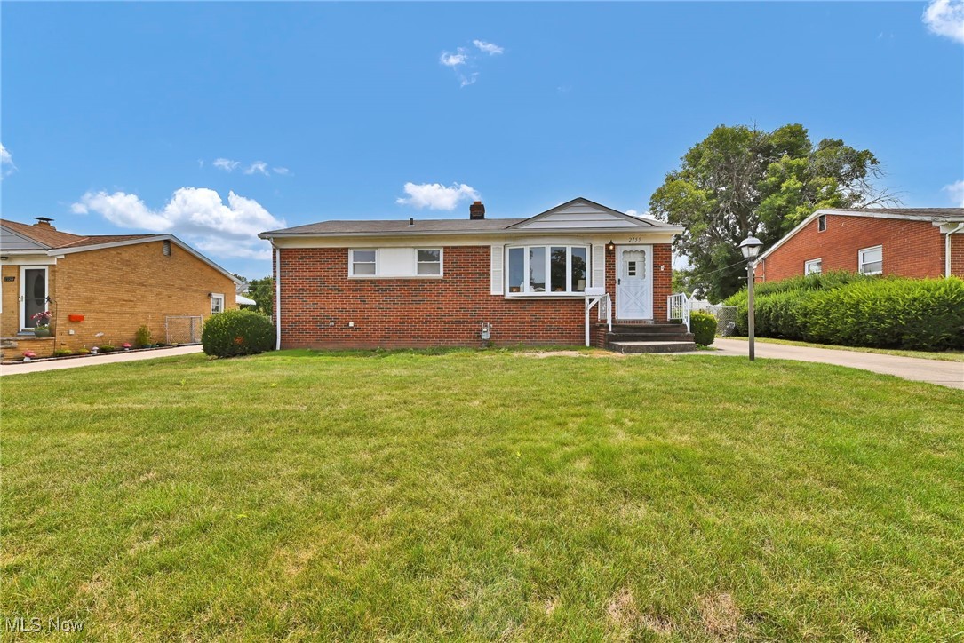 Welcome to this beautifully renovated 3-bedroom, 2-bath brick ranch in the heart of Parma! Step inside to discover hardwood floors, a spacious living area with tons of natural light, and a completely remodeled kitchen featuring brand-new tile flooring, quartz countertops, and stainless steel appliances. Downstairs, the finished basement offers the perfect space for entertaining, a home gym, or a second living area— complete with updated electrical and plumbing throughout for peace of mind. Enjoy summer evenings in the enclosed sunroom or make use of the oversized garage with plenty of room for parking and storage. With its solid brick construction, tasteful updates, and desirable location, this home is truly move-in ready. Don't miss your chance to own this gem in a quiet, established Parma neighborhood—schedule your showing today!