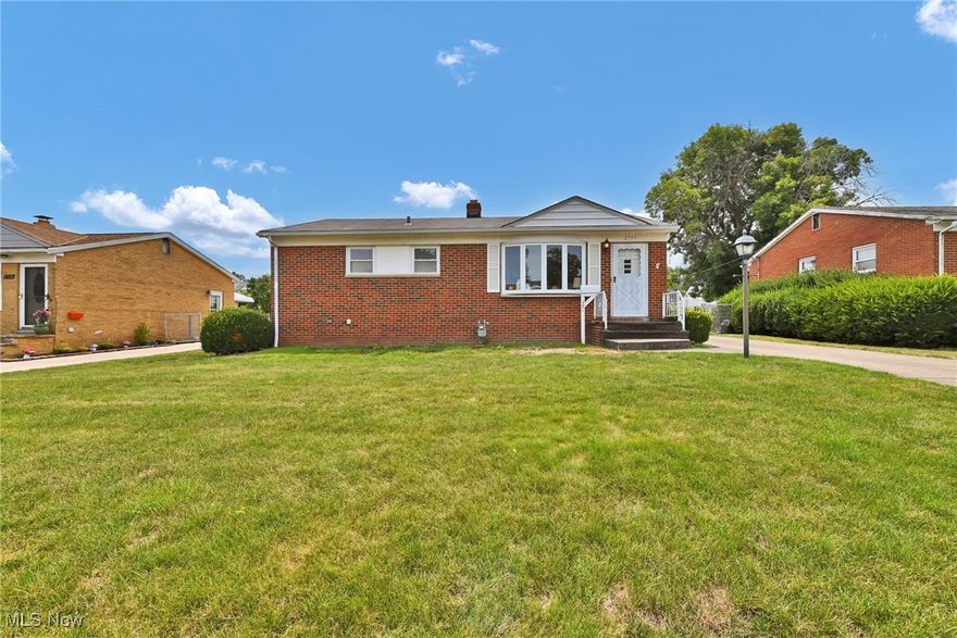 Welcome to this beautifully renovated 3-bedroom, 2-bath brick ranch in the heart of Parma! Step inside to discover hardwood floors, a spacious living area with tons of natural light, and a completely remodeled kitchen featuring brand-new tile flooring, quartz countertops, and stainless steel appliances. Downstairs, the finished basement offers the perfect space for entertaining, a home gym, or a second living area— complete with updated electrical and plumbing throughout for peace of mind. Enjoy summer evenings in the enclosed sunroom or make use of the oversized garage with plenty of room for parking and storage. With its solid brick construction, tasteful updates, and desirable location, this home is truly move-in ready. Don't miss your chance to own this gem in a quiet, established Parma neighborhood—schedule your showing today!