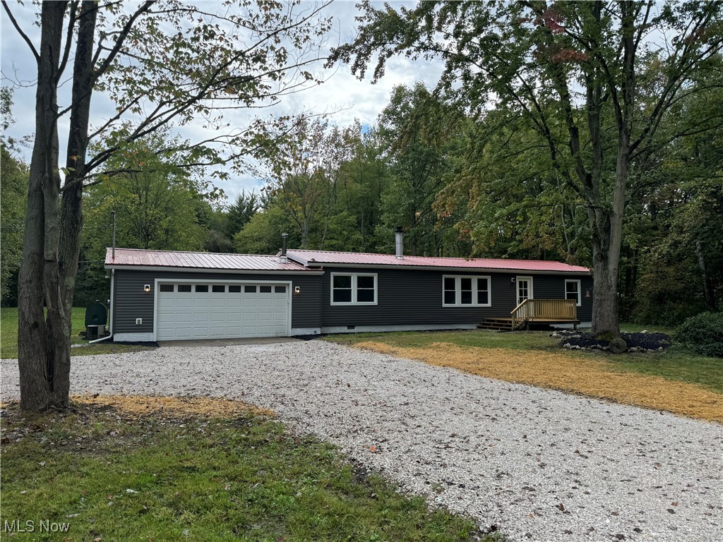 LOCATION LOCATION LOCATION !!!! Don't miss this remodeled 3 bedroom 2 bath ranch on almost 7 acres with a pond in Jefferson Schools on a paved road !!! As you pull in the driveway you realize what a private and peaceful setting this home sits on. New front porch to have your morning coffee and then you walk into the big living room with wood burning fireplace with plenty of room for your holiday gatherings. Brand new eat in kitchen with plenty of storage space and counter space for all your family dinners plus a dining room area. Big laundry room off of the attached garage with extra space for your lawn mower and tools. Split floor plan with master bedroom and remodeled master bath off of living room and 2 more bedrooms and fully remodeled bath on other side of living room. Sit and relax on your covered deck overlooking almost 7 acres with pond. It is so peaceful just sitting there watching all the wildlife. New metal roof, vinyl siding, windows, baths, kitchen, carpet and vinyl flooring. This home is ready for you to move in today !!!