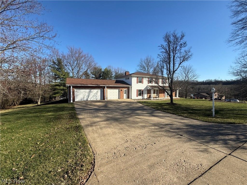 Photo of 220 Barrington Ridge, New Concord, OH 43762 (MLS # 5193075)