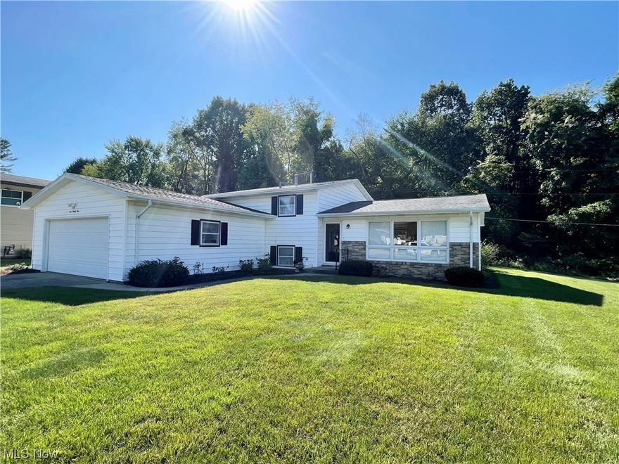 Well maintained split level home in fantastic neighborhood in Perry Twp. that backs up to Sippo Lake. 3 bedrooms, 1.5 bathrooms, 2 car attached garage. Nice large corner lot. Newer Trex deck. Quiet neighborhood centrally located.