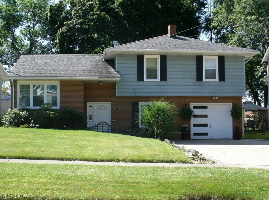 Well maintained Split Level home with a double driveway, all nicely landscaped having a well groomed backyard that is partially fenced.  Hardwood floors thoughout with sliding doors to a patio for relaxation.  The Family room has a wood fireplace with access to the garage or the basement.  This home has all new Windows of 3 yrs, HWT- 2 yrs, Dishwasher, Range Top,  Roof- 2005.  This home is close to school and Sidewalks for safety.   Also Home Warranty for Buyer- 1 year provided.