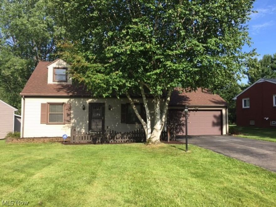 Great value with this maintenance free home featuring over sized living room with hardwood floors, formal dining room with fireplace, kitchen with brand new built ins (and center isle), rec room with bath, huge outdoor deck overlooks 300+ ft backyard.  High efficiency furnace.   2-10 warranty included.