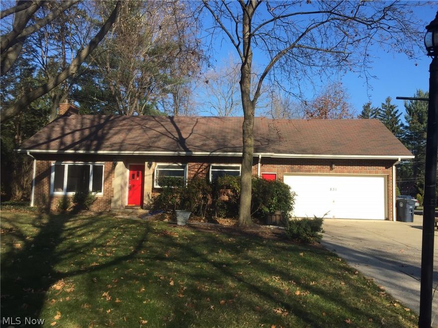 Welcome Home to a Updated Brick Ranch in the Highly Desirable West Akron Area. This home as been updated from the Newly Renovated Kitchen with Two Green House Windows, Quartz Countertops, Soft Closing Cabinets, Whirlpool Stainless Steel Appliance (included) and High End Laminate Flooring that flow into the Nook area. All New Carpet and Fresh Natural Paint Through out the home. Wonderful Wood Burning Fireplace that will keep you cozy in the winter time. Hall Bathroom is Handicap Accessible. Master Bedroom has a very nice size walk in closet, Jack n Jill bathroom, All Bedrooms have Ceiling Fans. Office has Beautiful Built-in Bookcase and Shelving Unit. Basement has a HUGE Rec area with a Wet Bar, Dedicated Laundry Room and Two Storage Areas. The Electrical has been updated. Front walk way and back patio have Sandstone Pavers. Please Call for a Private Showing.