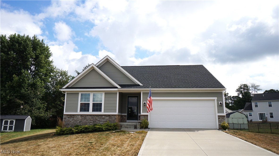 Just a few blocks from the heart of Louisville, this stylish ranch is so much more than move-in ready. Built in 2019 and set on a private cul de sac lot, the craftsman style façade, and stone accents offer stunning curb appeal. As you enter through the covered front porch and attractive glass paneled storm door, you are welcomed into a charming entry adorned with eye-catching LVP flooring that rambles throughout the main level. Continue down an ultra-wide hallway where French Doors provide access to a multi-purpose space that can be used as an office, sitting room or 3rd bedroom. Hallway opens into the voluminous Great Room highlighted by a Cathedral Ceiling and coupled seamlessly with the fully equipped Kitchen and Dining Area. Quartz Countertops, Stainless Steel Appliances including a new Bosch Dishwasher and a High-end Gas Range installed in 2021, Island with Breakfast Bar, Pantry Closet, and Commercial Grade Garbage Disposal elevate the Kitchen Space. At the back of the house, an adjoining Sunroom/Morning Room provides French Door access to a Trex Deck covered by a designer Gazebo furnished with a tasteful ceiling fan. Primary Bedroom Suite has a sizable Walk-in Closet and En Suite Bathroom equipped with low threshold shower stall, dual vanity with cultured marble countertop and sinks, ceramic tile flooring and comfort height toilet. A second Bedroom and Full Bath and conveniently located Mudroom/Laundry round out the main floor. Custom blinds provide privacy throughout the home. In the basement, which is plumbed for an additional bathroom, the homeowner is providing an additional Sump Pump for your peace of mind and an R/O Water Treatment System on both the Drinking Water and Ice Maker providing you purified water. Outside in the backyard, a sizable Storage Shed with a metal roof, lofted storage, a work bench, and electric is styled to match the home’s exterior. Call your favorite realtor today to schedule a private showing.