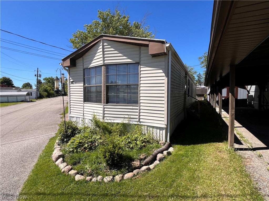 Photo of 12860 Mayfield Road #42, Chardon, OH 44024 (MLS # 5215337)