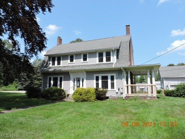 Buckeye Beauty! situated on a corner 0.9 acre lot in N Kingsville Village, this grand lady offers a large living room with a warming brick fireplace, hardwood floors, natural woodwork and access to the east side deck through beautiful wooden doors! The modern kitchen has tons of counter and cupboard space to make those extra special upcoming Holiday dinners! there are 3 baths (2 full on the 2nd floor and 1/2 on the 1st floor) and 3 good sized bedrooms with good closet space, hardwood floors and vinyl windows throughout!! The full unfinished basement offers good storage. The roomy floored attic would be great for a play room, hobby room or storage space. The detached 2 car garage has a floored 2nd story for storage .... All this just minutes from the Lake Erie shore, beaches shops and schools.