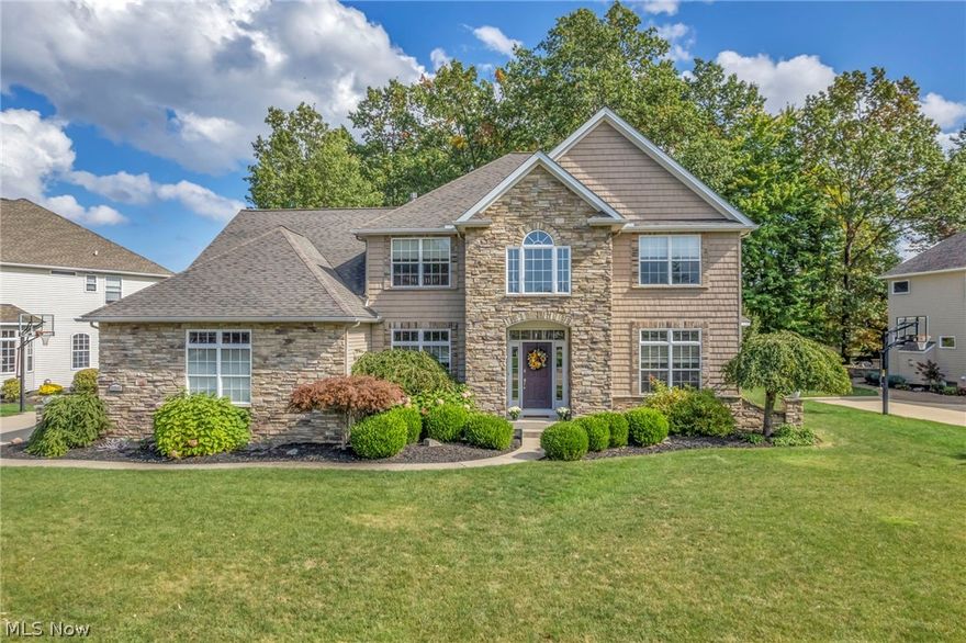 Welcome to this impeccably maintained charming 4-bedroom colonial home nestled in the serene town of Avon Lake, Ohio. This meticulously maintained residence offers a perfect blend of classic architecture and modern amenities, including a finished basement and four full bathrooms. As you approach the property, you'll be greeted by a manicured lawn and a welcoming facade adorned with traditional colonial details. Step inside to discover a spacious and inviting interior. The main level features a well-appointed kitchen with sleek countertops, ample cabinetry, and modern appliances, ideal for preparing delicious meals and hosting gatherings. Adjacent to the kitchen is a cozy breakfast nook, perfect for enjoying morning coffee while taking in views of the backyard. The adjoining family room featuring a fireplace for cozy evenings during colder months. A separate dining room provides an elegant setting for formal meals and celebrations. Upstairs, you'll find four generously sized bedrooms. The primary suite boasts a luxurious en-suite bathroom, complete with a soaking tub, separate shower, and dual vanities. The finished basement provides additional living and entertaining space. This versatile area can be used as a recreation room, or media lounge, including a home gym catering to various lifestyle needs. 2 additional private rooms are complemented by another full bathroom. Outside, a private backyard oasis awaits, featuring a patio area perfect for summer barbecues & outdoor gatherings. The lush landscaping and mature trees provide a tranquil setting for relaxation and play. Fenced yard offers a safe and secure area for pets to explore. Located in Avon Lake, this property offers proximity to top-rated schools, parks, shopping, and dining options. Enjoy the charm of small-town living while being conveniently close to major highways for easy commuting to Cleveland and other neighboring cities. Call to schedule your tour today to experience all that this home has to offer!