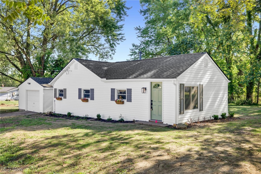 Welcome to 1125 Prospect Rd, where timeless charm meets modern convenience in this beautifully reimagined 2-bedroom, 1-bath home. From the moment you arrive, you’ll notice the fresh exterior with new siding, trim, gutters, and roof that create striking curb appeal. Step inside to discover a bright, airy interior freshly painted in soft neutral tones, complemented by all-new light fixtures that give each room a warm glow. The heart of the home is the stylish new kitchen, featuring gleaming cabinets, fresh countertops, a breakfast bar for quick bites, and an adjoining dining nook that’s perfect for intimate meals. Brand new stainless appliances, including a refrigerator, oven, range, and dishwasher make this space both functional and inviting. The bathroom has been completely refreshed with modern finishes, blending clean design with everyday comfort. Plush new carpet adds coziness underfoot, while large windows bring in natural sunlight throughout. A detached one-car garage offers convenience and extra storage. With new central air, furnace, hot water tank, electrical panel, and windows, every major system has been upgraded for peace of mind. Blending thoughtful design with everyday practicality, this home is a perfect mix of comfort, efficiency, and move-in-ready style. The adjacent lot can also be negotiated as a part of the sale.