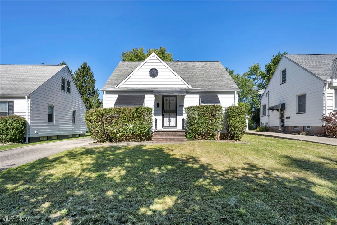 Welcome home to this charming Maple Heights residence featuring three spacious bedrooms, a full finished basement, and a generous backyard perfect for outdoor living. Upon arriving, you'll love the freshly painted exterior of the home and nice curb appeal. From the inside, you are greeted with a large living room and an inviting layout with plenty of natural light throughout. The kitchen features nice cabinetry with laminate counters, an eat at bar and includes appliances! Two bedrooms are located on the first floor with nice size closets, and a full bathroom is also conveniently located down the hall. Upstairs, currently used as a game room, you will be amazed with the great size primary bedroom that offers a walk-in closet and newer carpet! The finished basement expands your living space, offering endless possibilities for a recreation room, movie theater, or gym. Outside, the oversized yard provides room to entertain, garden, or simply relax in your own private retreat. This home is located near shopping, dining, parks, and major highways, combining comfort, functionality, and convenience all at a great price! Schedule your showing today!