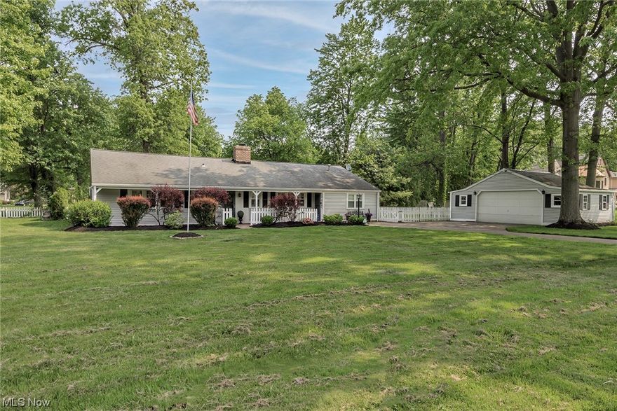 Don't be fooled by a Hilliard Blvd address!  This home is located at the sought after far west end of Hilliard where it adjoins with Lincoln.  A wonderful quiet location in Westlake on a large (over .5 acre) corner lot in a beautiful park like setting! Bright and well maintained three bedroom ranch home offering a split floor plan with a large Master suite on one side with two additional spacious bedrooms and updated full bath on the other.  Hardwood flooring throughout living areas including large family room with brick wood-burning fireplace opens to the dining room. The hardwood flooring continues into the open kitchen which was updated with granite countertops, tile backsplash and all new stainless steel appliances (2018). There is a large breakfast bar and expansive walk in pantry for additional storage. The spacious multi-purpose laundry/mud room offers additional storage along with access to a pull down attic.  Expansive wooden deck, bench seating and paver walkway were added to