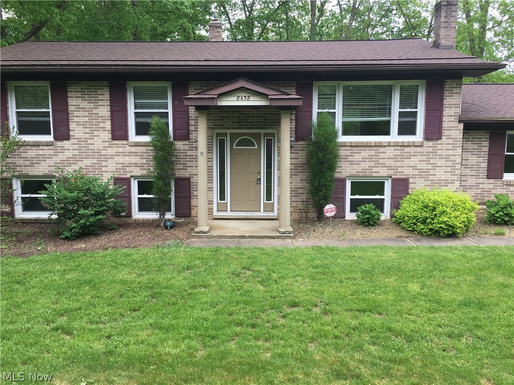 Welcome to the serenity of the country while being close to everything that Jackson Twp. has to offer! Wonderful brick/vinyl bi-level that offers 4-5 bedrooms, 2 full baths & side-load garage. First floor offers a large living room & dining room w/beautiful original hardwood floors that lead out to a 3-tiered deck overlooking a huge backyard, updated kitchen w/SS appliances & hard surface countertops, 3 nice-sized bedrooms and full updated bath complete the first floor. The lower level offers a bright family room w/woodburning fireplace & 2 add'l large bedrooms or extra living space w/a full updated bath. The entire interior has been freshly painted & carpets cleaned ready for you to move in and call this home! Home Warranty provided for your peace of mind! Call today to view this lovely home!