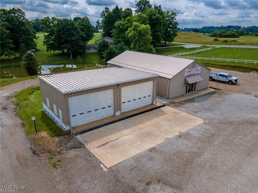 Rare Opportunity to own this excellent commercial property! Ideally located on high-traffic roadway, minutes from town and major interstate. Two buildings totaling 4300 sf. Building 1 is 2600 sf of insulated heated space with 700+ sf of office space with a full bathroom. Building 2 features 2 14' x 21' overhead doors with openers and 1700 sf. The possibilities are endless for major income producing businesses!