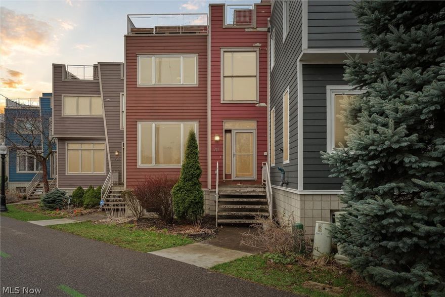 This property provides a unique living opportunity: it has exceptional access to great neighborhoods and restaurants (Tremont and Ohio City), downtown Cleveland, the West Side Market.  The Towpath is just a few steps away from the front entrance, while remaining quiet and insulated from street noise. This two bedroom, two and a half bath luxury Townhome has views of the city from all three floors.  The home features along two decks for outdoor enjoyment. The deck off the kitchen is an excellent location for a grill and outdoor eating area. The upstairs deck has a natural gas fire pit and spectacular views of downtown and the river.  It is a great location to watch passing freighters and fireworks from Progressive Field. The upper level Great Room has a bar and sliding glass doors to open up the room to the beautiful view. The interior of the house is just as spectacular. Beautiful maple hardwood floors throughout, a remodeled kitchen, and bathrooms. The six burner, double oven range in the center of the concrete countertops provides a kitchen that has been designed for cooking as well as entertaining. The bathrooms are aesthetically appealing and have been designed to be practical for everyday life. Both bedrooms are very spacious with large closets. The master bedroom has two separate large closet areas, ideal for a couples with large wardrobes. A two car garage is located under the house, located on West 7th Place.