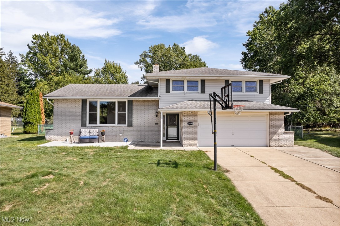 Don’t miss this rare all BRICK split level with a half acre fenced in on a cul-de-sac in Middleburg Heights! No HOA! Step into the large living room with beautiful hardwood floors, fresh paint, and large picture window. Updated kitchen with wood cabinets, stainless steel appliances, and granite countertops. Additional cabinets and countertops were brought into the dining room for extra storage and entertaining space. The family room below leads to a half bath, as well as glass sliding doors to the huge fenced in backyard, cement patio which spans the entire back of the house, and oversized 10x20 shed. There is even a smaller fenced in area with a separate side entrance for a private garden or doggy area! Upstairs, you will find 3 generously sized bedrooms, all with hardwood floors and fresh paint. The full bath features granite countertop and newly tiled shower with new tub and glass doors. The basement adds additional storage space, laundry room (washer/dryer stay!), storage cabinets (stay!), and a separate side which can easily be finished for even more living space. 2 car attached garage and close proximity to the metro parks, shopping, schools, and freeways. 2 year Select Home Warranty provided for your peace of mind! Additional updates include: Primary bathroom remodel (2025) including tiled shower with glass door, tub, fixtures, vanity, toilet, Furnace and AC (~2018), new hot water tank (2025), insulation for attic (2018). Schedule your tour today!