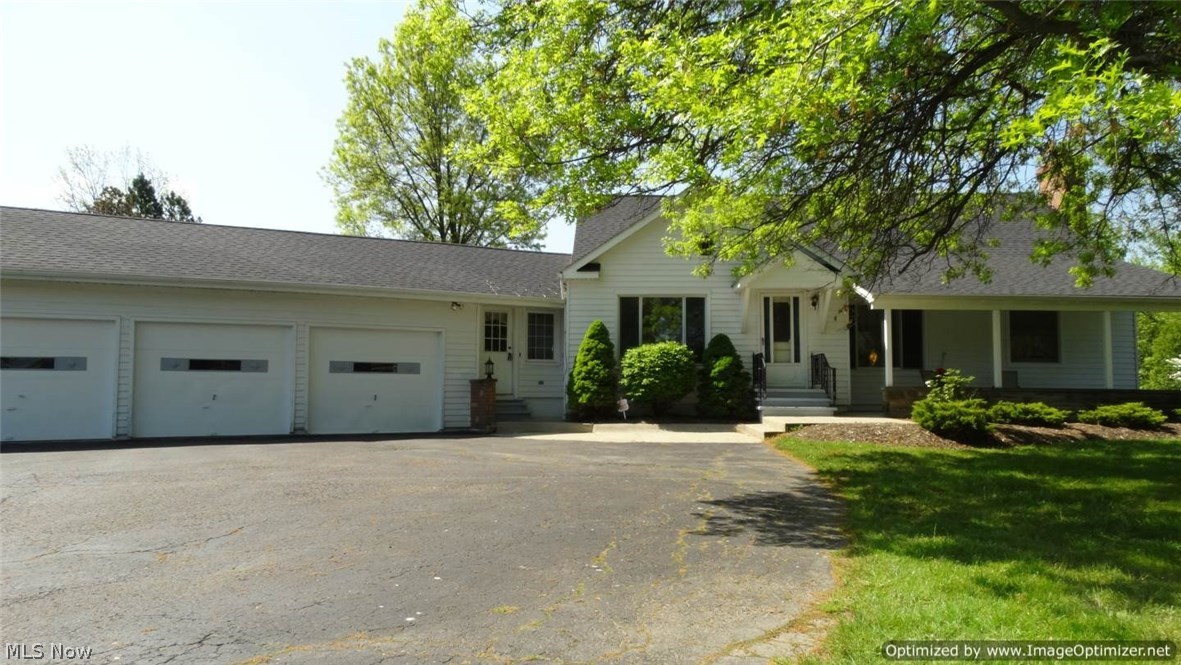Wonderful 4 Bedroom & 2 Full Bath Bungalow set on nearly 2 peaceful acres! Many updates in 2008, this home offers Living Room & Dining Room with hardwood floors and large expanded Family Room. Kitchen with plenty of cabinets & counter space and ceramic floors. 3 first floor bedrooms & full bath with jetted tub. Second level offers Master Suite with skylights, double closets, full bath with garden tub & separate stall shower plus office/den or possible 5th bedroom. Partially finished walk-out lower level includes Rec Room with wood burning fireplace and plenty of storage. Central air. Newer roof. Large deep backyard. Covered front patio, paved drive and 3-car attached garage. Make this home your own! 1-yr Home Warranty. Chardon Local Schools.