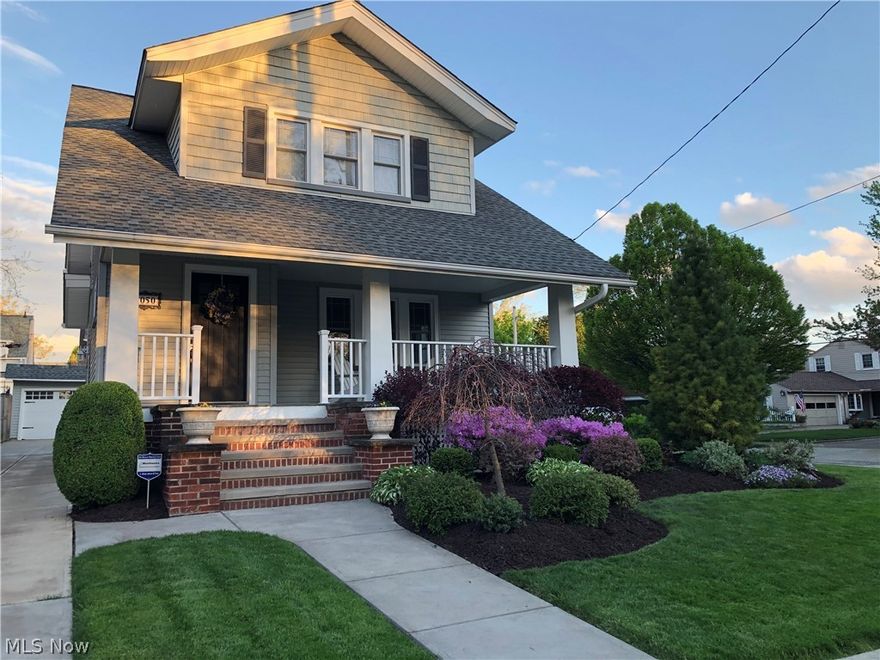 One of Lakewood's Premier Neighborhoods! Every inch of this 3 bedroom colonial has been meticulously restored by two engineers, and they kept the charm of 1925 with the conveniences and luxuries available today. The welcoming front porch leads into a beautiful entry and living room w/ wood burning fireplace and gleaming hdwd floors. The flrs continue into the dining and family rooms, all freshly painted in modern, neutral colors. The sun room has ceramic tile flrs, a gorgeous view and wooden blinds. Natural light fills the entire home. The eat-in kit has heated ceramic flrs, brkfst bar, dbl farm sink, stainless appliances, including a gas range/oven, granite countertops, vaulted ceiling, & Kraftmaid, hickory cabinets w/ soft close doors and drawers. There is a 1/2 bath off the kit. All bedrooms have gorgeous hardwood floors and walk-in closets. The Mstr has his & her closets. The smaller bedroom leads out to the balcony where you have views of Lake Erie. There is a large full bath on t