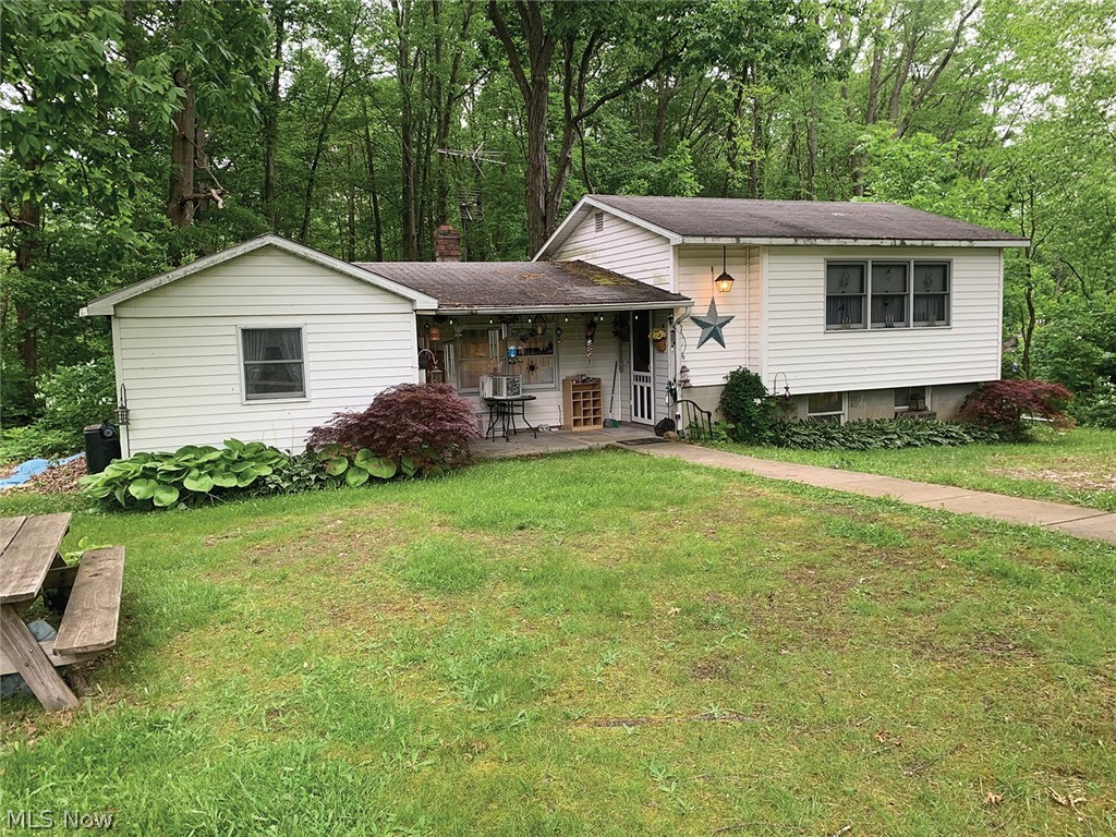 2.86 Acres Of Heavily Wooded Land With Three-Bedroom Split-Level Home, 24 X 32 Garage & Pole Barn, Secluded Setting, Timber, Deer, Turkey, Randolph Twp., Portage Co. - Live Onsite With Online Bidding Available On Real Estate. ABSOLUTE AUCTION, all sells to the highest bidder on location. ONLINE AND LIVE ON-SITE BIDDING WILL BEGIN WEDNESDAY, JUNE 26, 2024, 10:00 AM, REAL ESTATE SELLS AT 11:00 AM. 2.86 acres, park-like setting with timber, wildlife, fixer upper 1700 sq. ft. home, covered porch, three bedrooms, bath, kitchen, pantry, partial block basement, FA oil heat, breaker electric, 24 X 32 garage with auto opener and concrete. Close to West Branch Reservoir. Parcel #293280000034000. Nice setting. The home will be open for viewing on Tuesday, June 25, 2024 - 3:00 PM - 5:00 PM. TERMS ON REAL ESTATE: 10% down auction day, balance due at closing. A 10% buyer’s premium will be added to the highest bid to establish the purchase price. Any desired inspections must be made prior to bidding. All information contained herein was derived from sources believed to be correct. Information is believed to be accurate but not guaranteed.