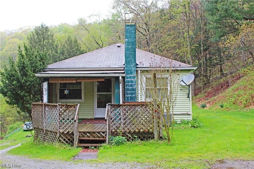 Cute 2 bedroom 1 bath home in Hancock County on 8 acres. Nice location outside of New Cumberland.
