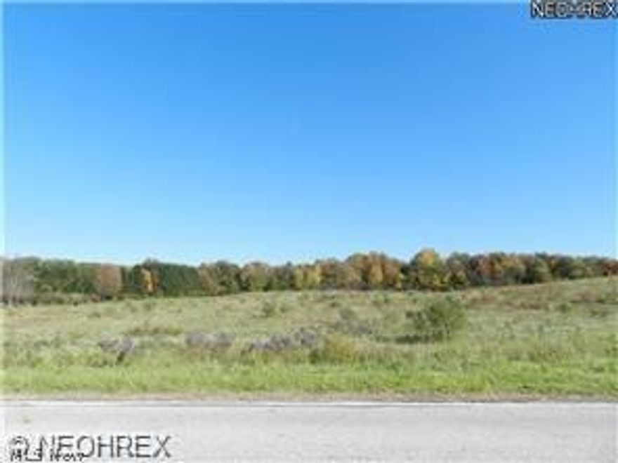 Simply a spectacular piece of property!! 3+ beautiful country acres close to the city!! Build your dream home!! Lot is surrounded by many newer high end homes and backs up to May Ct. Approximately 4 or 5 lots north of Bartholomew on the east side of the street. Bring your own builder!! You must see the complete property for yourself to appreciate the beauty and serenity!!