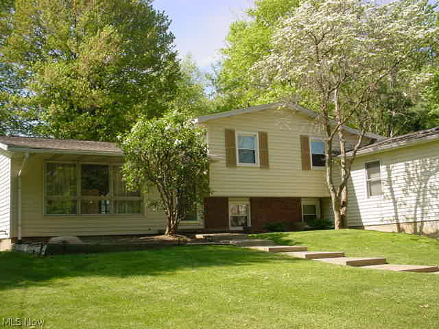 Wow! 3240 sq ft 4 level split! Addition great for in law suite, in home office/business or bed #4 & 5! Cathedral beamed sun room w/wrap around deck built 1991! Remodeled kitchen with appliances! Family rm w/woodburning stove! 3 bed, 2 baths and 2 extra lg bonus rooms! 6 skylights, 2 furnaces & 2 AC, hardwood floors and privacy fenced yard! 2013 new roof, tear off! Very unique home with many options! 2 car garage under, separate entrance to addition, storage shed!