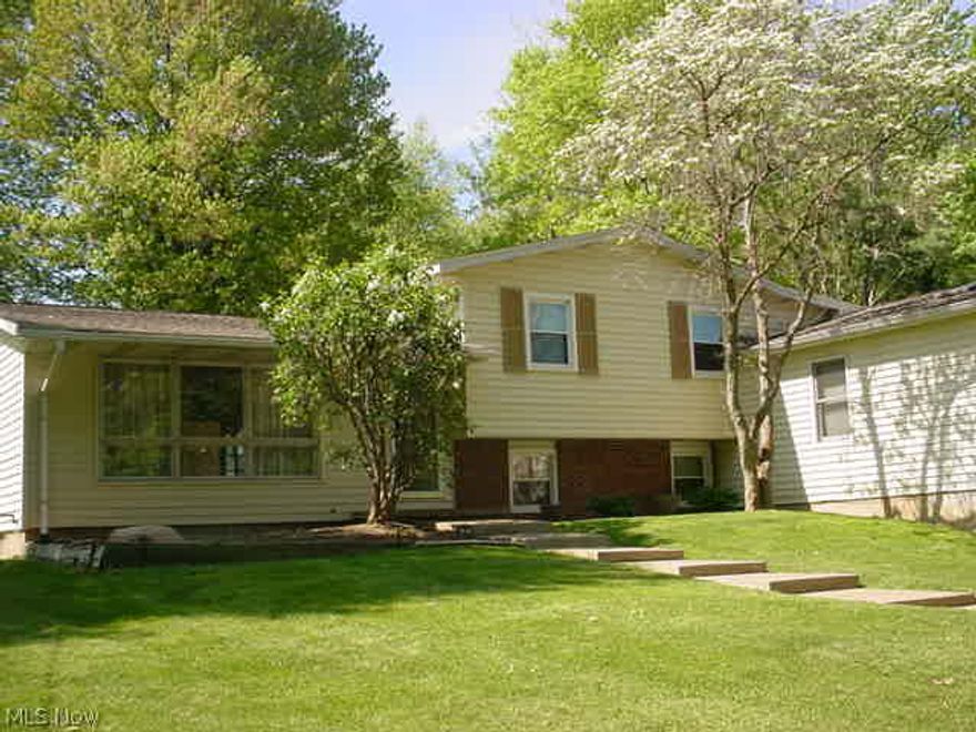 Wow! 3240 sq ft 4 level split! Addition great for in law suite, in home office/business or bed #4 & 5! Cathedral beamed sun room w/wrap around deck built 1991! Remodeled kitchen with appliances! Family rm w/woodburning stove! 3 bed, 2 baths and 2 extra lg bonus rooms! 6 skylights, 2 furnaces & 2 AC, hardwood floors and privacy fenced yard! 2013 new roof, tear off! Very unique home with many options! 2 car garage under, separate entrance to addition, storage shed!
