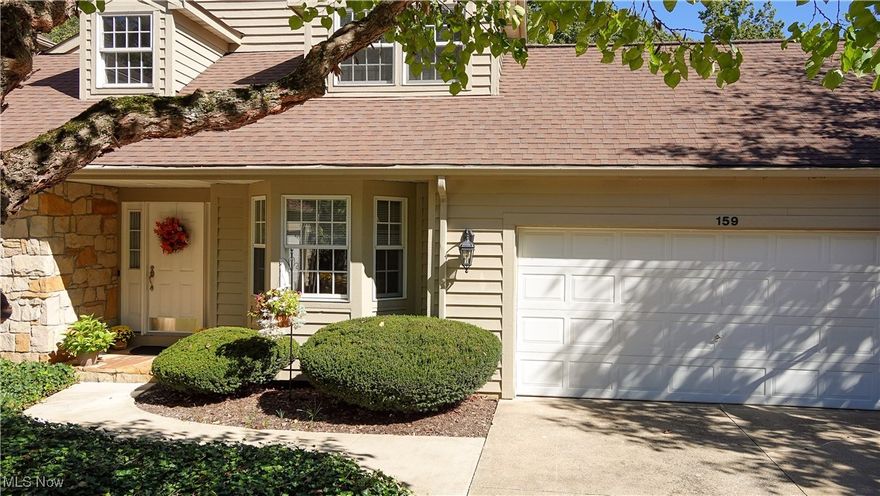 Beautifully renovated Condo in the Oaks of Aurora.  This unit offers a tall vaulted foyer and living room with gas fireplace, updated first floor master suite including a gorgeous master bathroom walk in closet and access to the back deck with lovely views of the woods.    The kitchen has white cabinets, granite counter tops stainless steal appliances plenty of pantry space and great dining space and desk space.    Off the kitchen is a great sitting room that could also serve as a home office.  The second level has a loft and two very spacious bedrooms each with a walk in closet and a nicely updated full bathroom with granite counter tops.   The lower level offers endless possibilities but right now serves well as a workshop, exercise space and recreational retreat.    Step out onto the back deck from the master suite or living room and into a private oasis overlooking the woods and ravine.  You really need to see this beautiful home before its too late.