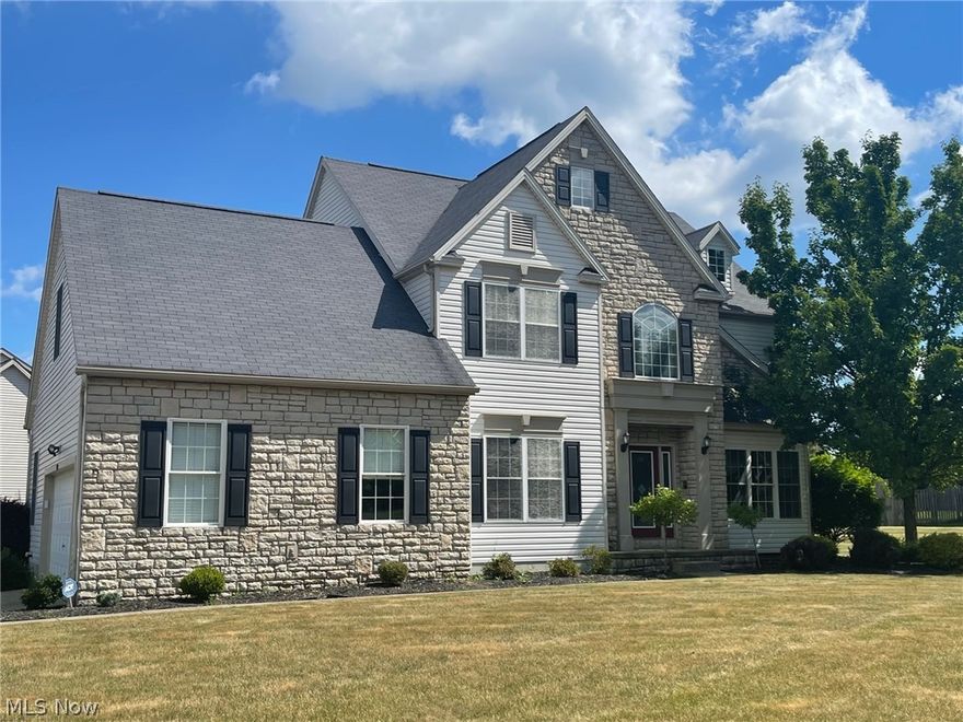 Custom built four bedroom 3 1/2 bath home with 9-foot ceilings two-story foyer vaulted master suite with bonus room and master bath with whirlpool tub with separate shower fireplace in the master bedroom. It has an open floor plan large kitchen wtih granite countertops and it is open to the breakfast area which also has a fireplace. This home also features an office on the first floor. The basement has a theater room and there is also a large rec area with a pool table plus full bath in the basement. This house has so many extras I can’t even list them all! Make an appointment today. $5000 Flooring allowance offered by seller.